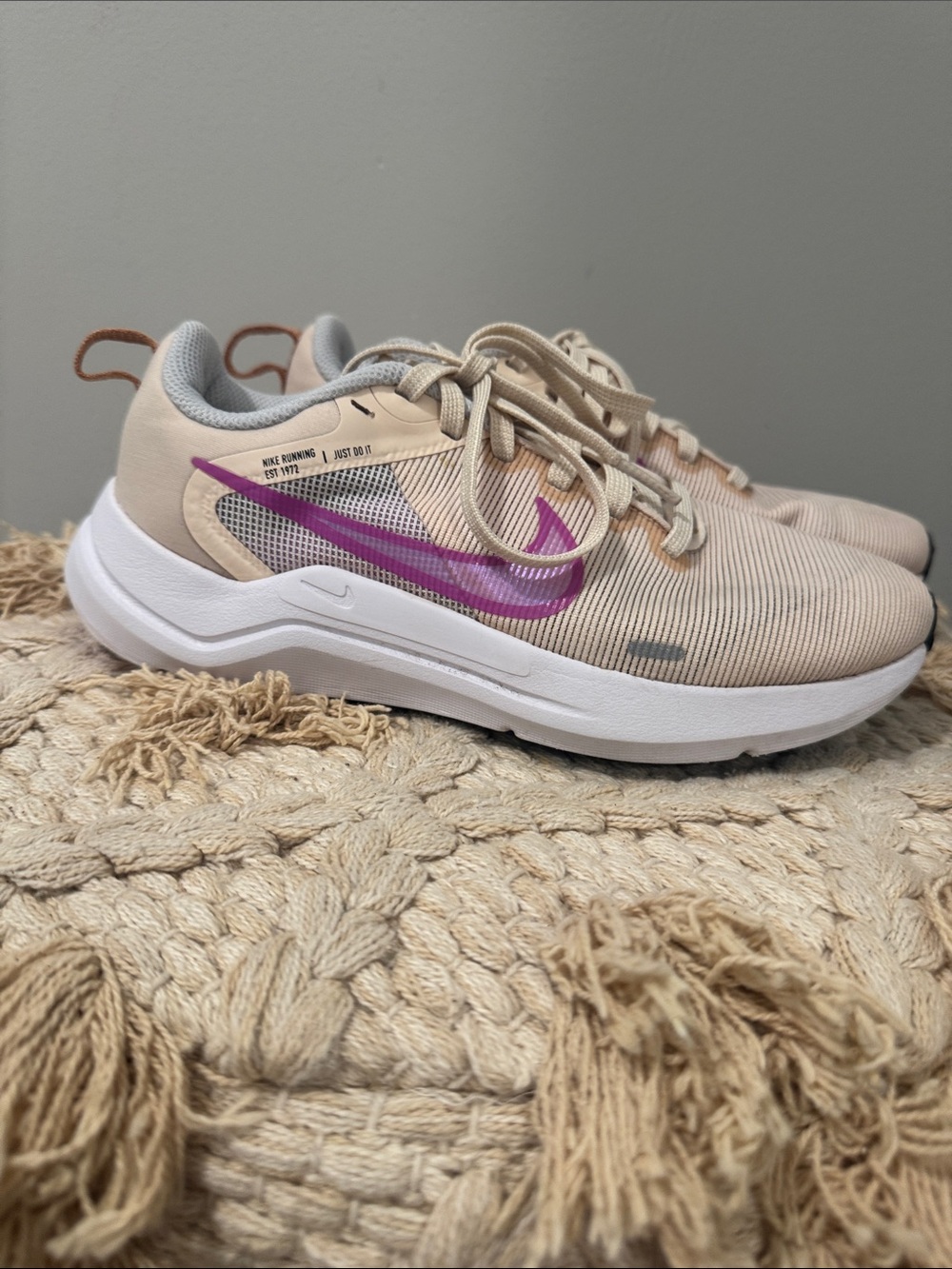 Nike Women's Beige Athletic Sneakers with Pink Swoosh